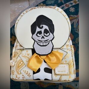 Loungefly Coco Cream and Gold Backpack